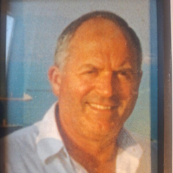 Portrait of Seamie McDonagh smiling outdoors beside the sea.